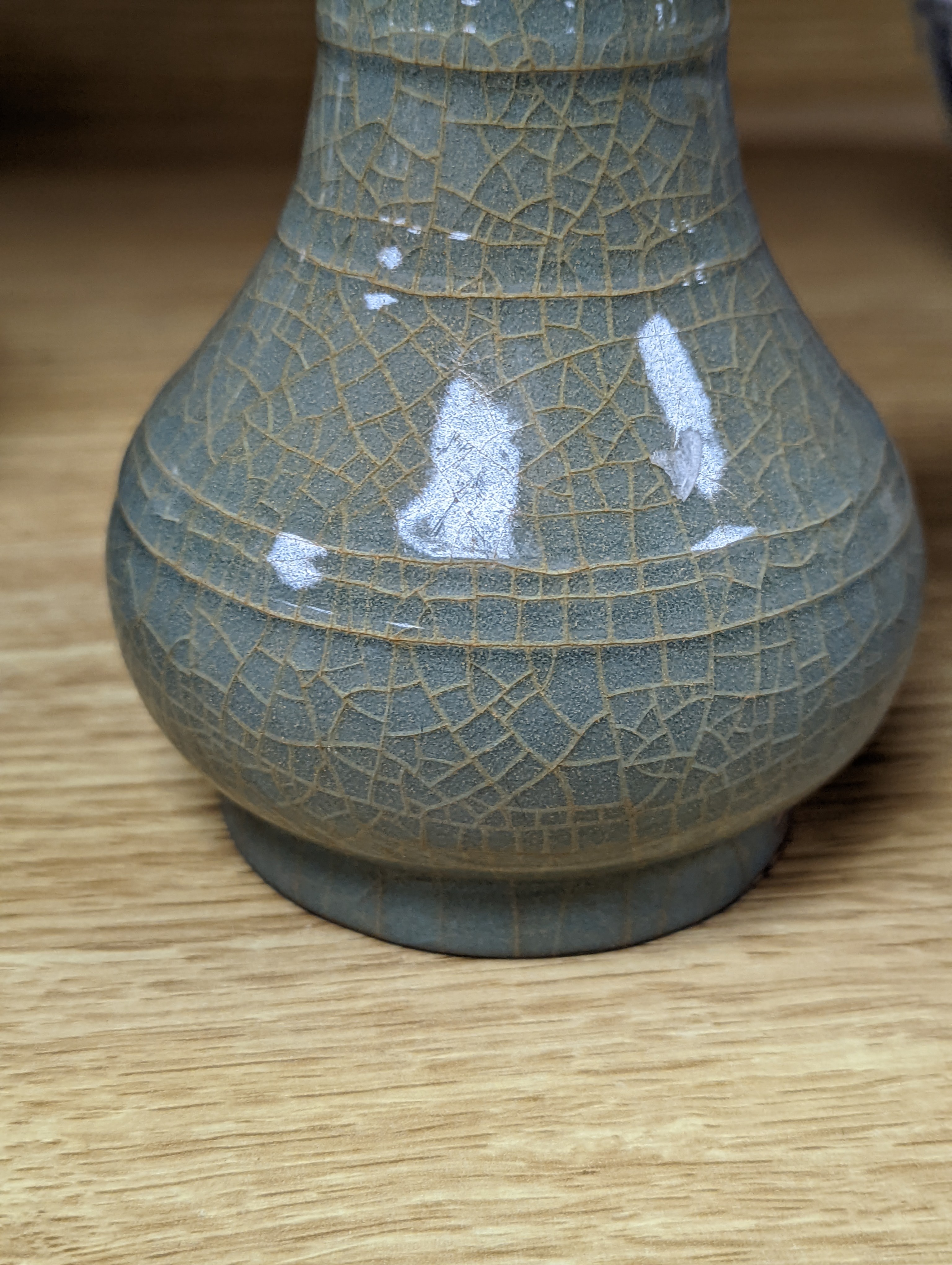 A Chinese celadon bottle vase 15.5cm